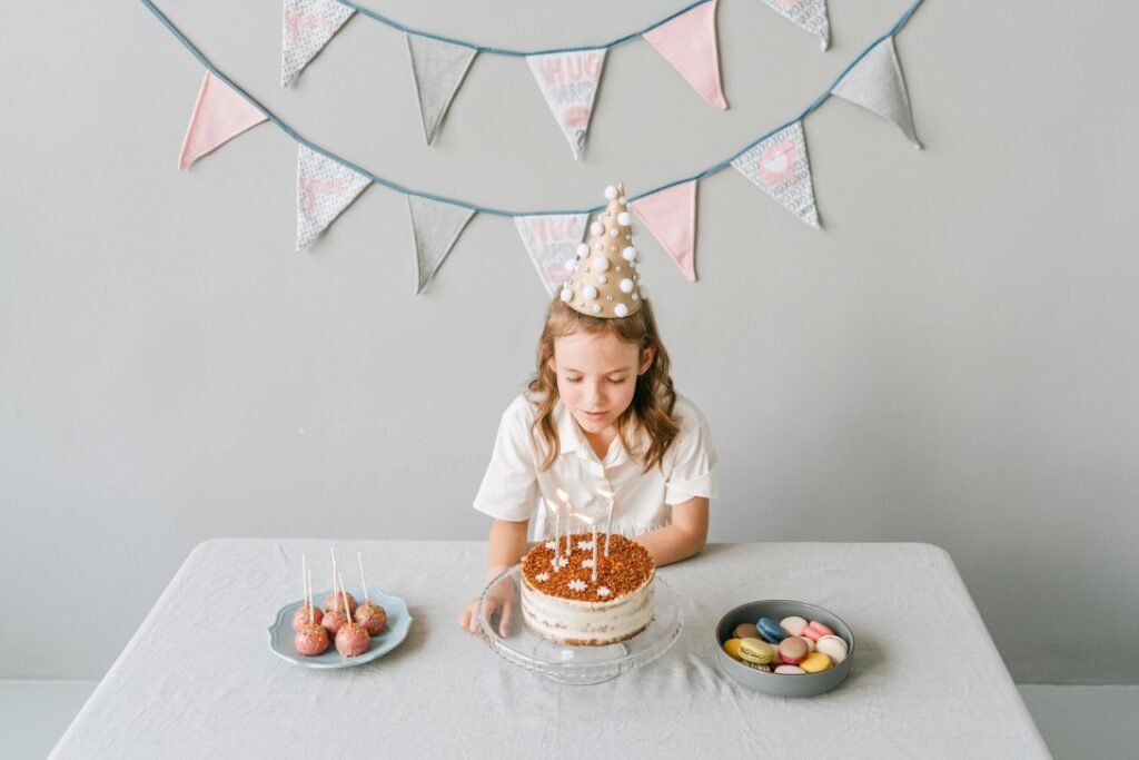 Girl cutting her birthday cake